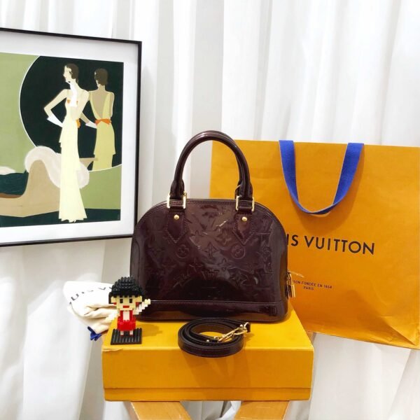 Preloved Louis Vuitton Alma BB Two-Way Bag in Amarante Vernis Leather - Image 2